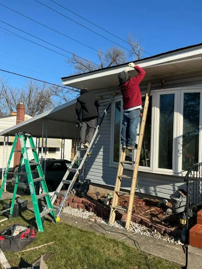 Restoration crew performing exterior repair in Allegany